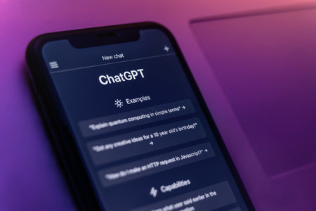 Antalya, Turkey - May 8, 2023: ChatGPTs chatbot interface, utilizing Open AI advanced artificial intelligence technology, is displayed in vibrant neon light on the smartphone. Copy spaceのeditorial素材