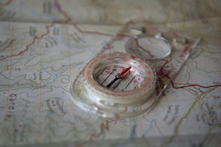 A compass on a geophysical map.の写真素材