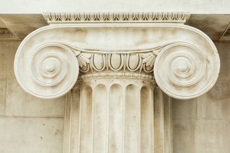 Decorative detail of an ancient Ionic column. close up.の写真素材