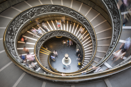 Blurred motion of tourists descending the Bramante staircase inside the Vatican museumのeditorial素材