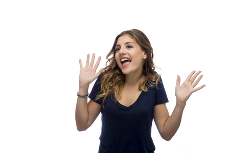 Surprised young beautiful woman, isolated on white backgroundの写真素材