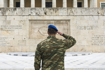 Elite soldier of the presidential guard at attention  front of the monument of the Unknown Soldier in Athens, Greece.の写真素材