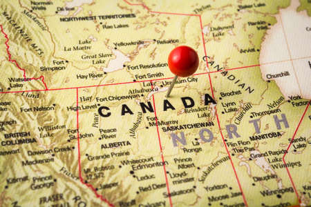 Red push pin marking Canada on the map. Close up, selective focusの写真素材