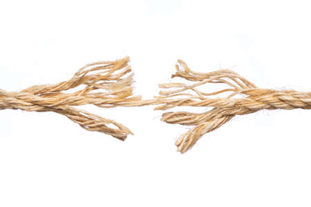Frayed rope ready to break isolated on white background
