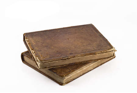 Stack of Old frayed books isolated over white backgroundの写真素材
