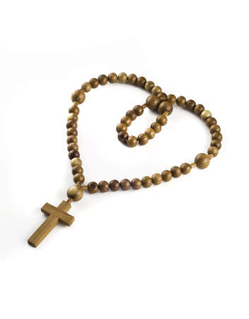 Closeup of Heart figure made of Wooden beads isolated over whiteの写真素材