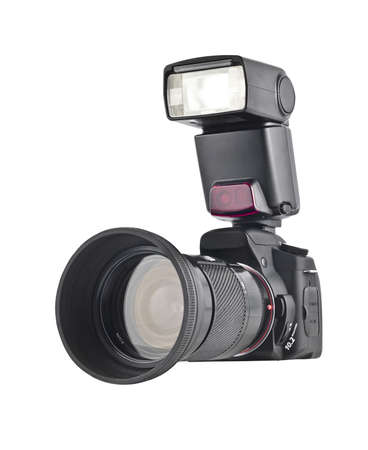 Professional camera with telephoto lens and flash isolated over whiteの写真素材