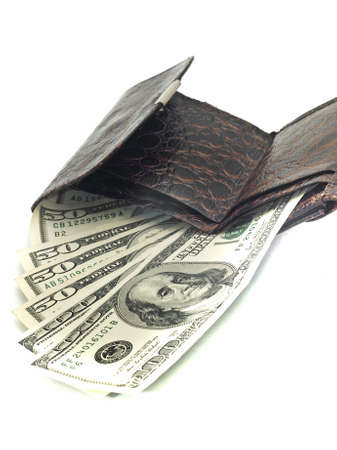 US dollars in old leather purse (shallow DOF)