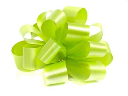 lettuce green holiday ribbon for presents and gifts over whiteの写真素材