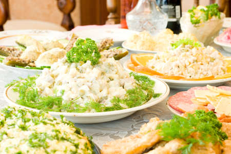 Tasty dishes. Banquet in the restaurant. Focused on one dish (shallow DOF)の写真素材