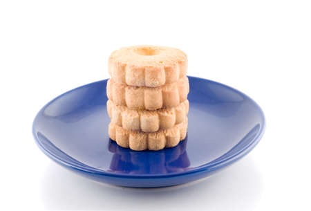 Cookies on the plate over white backgroundの写真素材