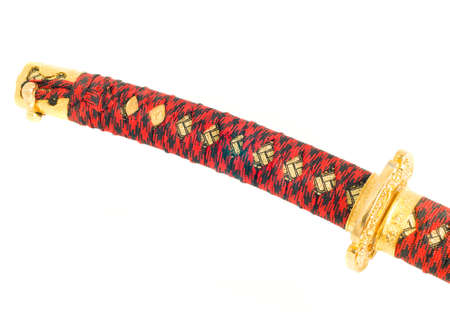 Closeup of katana sword handle isolated on whiteの写真素材