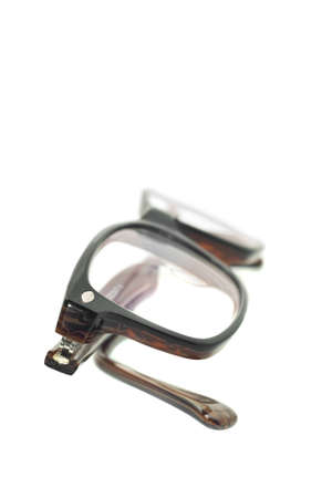 Modern eyeglasses over white background (shallow DOF)の写真素材