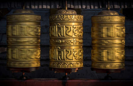 Buddhist shiny prayer wheels in motion. Nepal, Kathmanduのeditorial素材