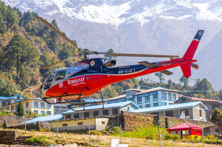 Rescue helicopter in Lukla airport in Himalayas, Captured in autumn 2013, Nepal, Khumbu regionのeditorial素材