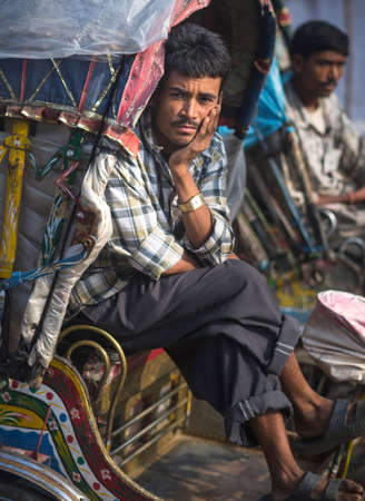 rickshaw driver waiting for clients on Durbar square in Kathmandu. Captured in Nepal, autumn 2013のeditorial素材