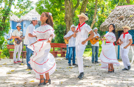 Dancers in costumes and musicians perform traditional cuban folk dance. Cuba, spring 2018のeditorial素材