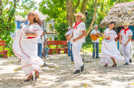 Dancers in costumes and musicians perform traditional cuban folk dance. Cuba, spring 2018のeditorial素材