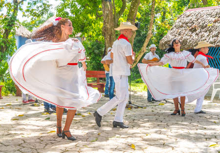 Dancers in costumes and musicians perform traditional cuban folk dance. Cuba, spring 2018のeditorial素材
