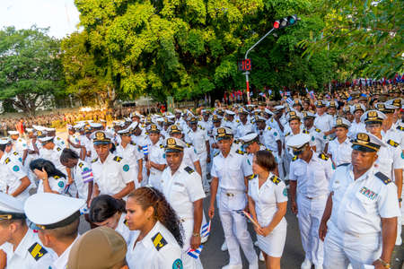 People marching with flags during May day parade or International Workers' Day, Havana, Cuba, spring 2018のeditorial素材
