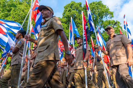 People marching with flags during May day parade or International Workers' Day, Havana, Cuba, spring 2018のeditorial素材