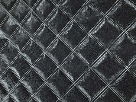 Alligator or crocodile black Leather. Square stitched texture or background with bumps. 3d render, 3d illustrationの写真素材