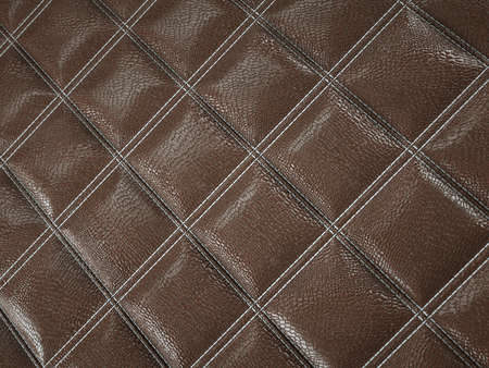 Alligator or crocodile brown Leather. Square stitched texture or background with bumps. 3d render, 3d illustrationの写真素材