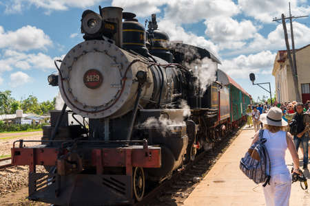 Old steam locomotive or train for tourists ariive at the station. Cuba, spring 2018のeditorial素材