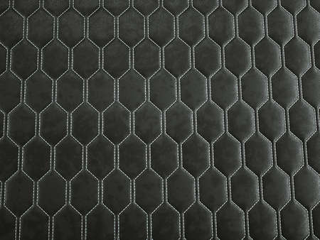 Leather stitched hexagon or honecomb black shiny texture or background with bumps. 3d render, 3d illustrationの写真素材