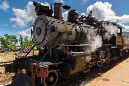 Old steam locomotive or train for tourists ariive at the station. Cuba, spring 2018のeditorial素材