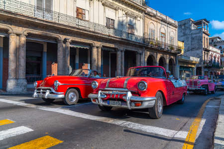 Retro car as taxi with tourists in Havana, Cuba. Captured near Paseo del Prado in spring 2019のeditorial素材