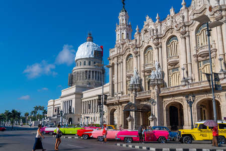 Retro cars as taxi with tourists in Havana, Cuba. Captured near Gran Teatro de La Habana, El Capitolio and Paseo del Prado in spring 2019のeditorial素材