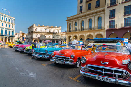Retro car as taxi for tourists in Havana, Cuba. Captured near Gran Teatro de La Habana, El Capitolio and Paseo del Prado in spring 2019のeditorial素材