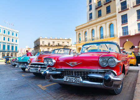 Retro car as taxi for tourists in Havana, Cuba. Captured near Gran Teatro de La Habana, El Capitolio and Paseo del Prado in spring 2019のeditorial素材