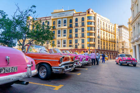 Retro car as taxi for tourists in Havana, Cuba. Captured near Gran Teatro de La Habana, El Capitolio and Paseo del Prado in spring 2019のeditorial素材
