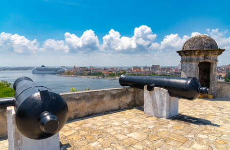 Cannons at Fort of Saint Charles or Fortaleza de San Carlos de la Cabana and cruise ship in Havana, Cuba. spting 2019のeditorial素材