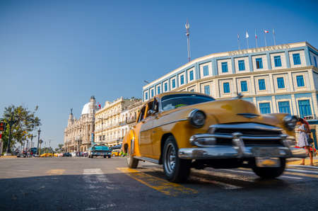 Gran Teatro de La Habana, El Capitolio and retro cars in Havana Cuba. Captured near Gran Teatro de La Habana, El Capitolio and Paseo del Prado in spring 2019のeditorial素材