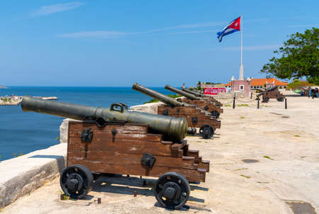 Cannons at Fort of Saint Charles or Fortaleza de San Carlos de la Cabana, cuban flag in Havana, Cuba. spting 2019のeditorial素材