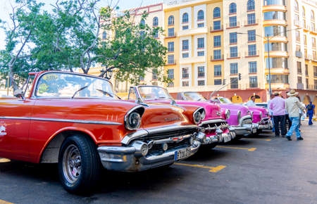 Retro car as taxi for tourists in Havana, Cuba. Captured near Gran Teatro de La Habana, El Capitolio and Paseo del Prado in spring 2019のeditorial素材