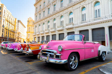 Retro car as taxi for tourists in Havana, Cuba. Captured near Gran Teatro de La Habana, El Capitolio and Paseo del Prado in spring 2019のeditorial素材