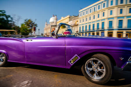 Retro car as taxi for tourists in Havana, Cuba. Captured near Gran Teatro de La Habana, El Capitolio and Paseo del Prado in spring 2019のeditorial素材