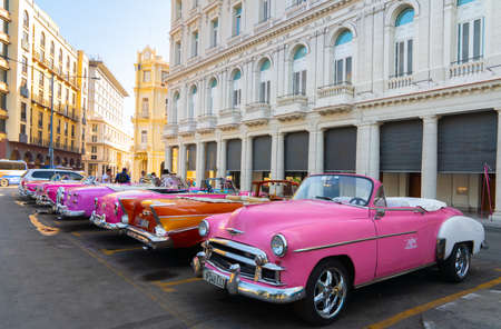 Retro car as taxi for tourists in Havana, Cuba. Captured near Gran Teatro de La Habana, El Capitolio and Paseo del Prado in spring 2019のeditorial素材