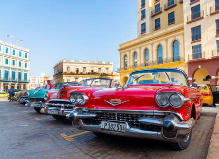 Retro car as taxi for tourists in Havana, Cuba. Captured near Gran Teatro de La Habana, El Capitolio and Paseo del Prado in spring 2019のeditorial素材