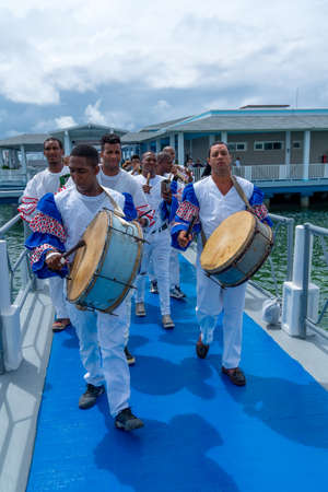 Cuban Musicians in traditional costumes perform for tourists, Santa Maria, Santa Clara, Cuba, spring 2018のeditorial素材