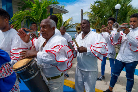 Cuban Musicians in traditional costumes perform for tourists, Santa Maria, Santa Clara, Cuba, spring 2018のeditorial素材