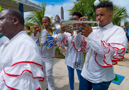 Cuban Musicians in traditional costumes perform for tourists, Santa Maria, Santa Clara, Cuba, spring 2018のeditorial素材