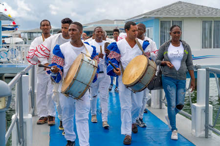 Cuban Musicians in traditional costumes perform for tourists, Santa Maria, Santa Clara, Cuba, spring 2018のeditorial素材