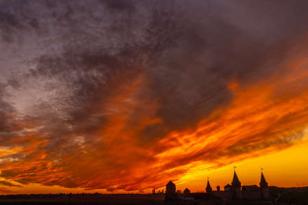 medieval castle or stronghold silhouette and beautiful sunset. Tourism in Europeの写真素材