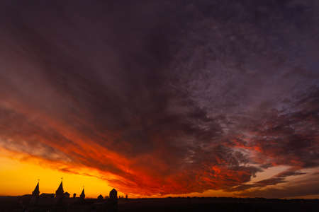 medieval castle or stronghold silhouette and beautiful sunset. Tourism in Europeの写真素材