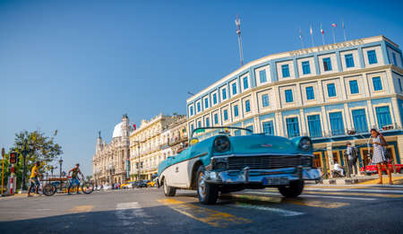 Gran Teatro de La Habana, El Capitolio and retro cars in Havana Cuba. Captured near Gran Teatro de La Habana, El Capitolio and Paseo del Prado in spring 2019のeditorial素材